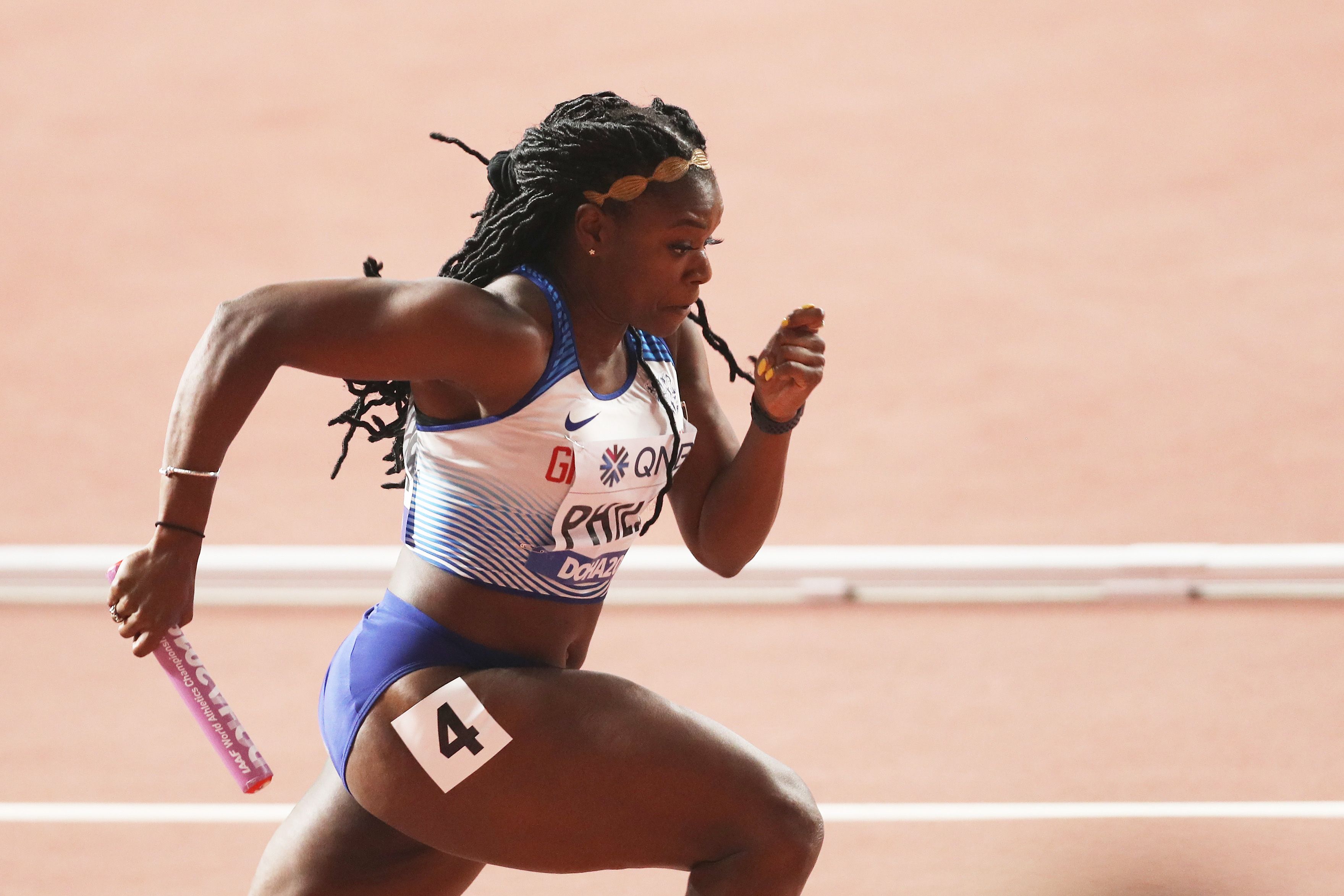 asha-philip-of-great-britain-competes-in-the-womens-4x100-news-photo-1601477563 (1)